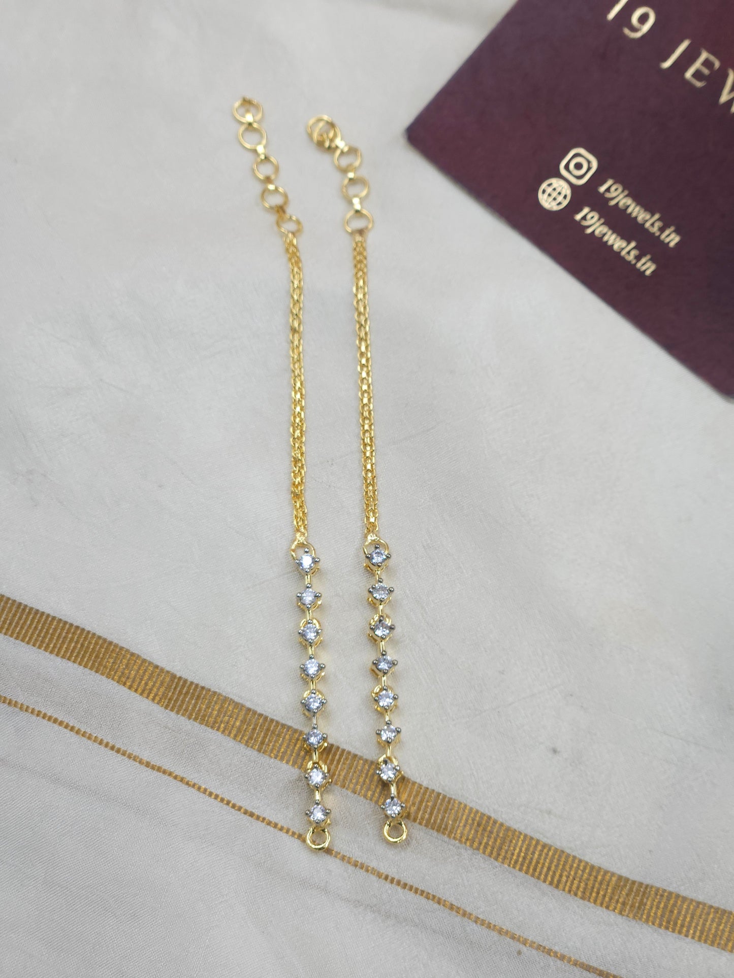 Diamond look alike ear chain Ea247