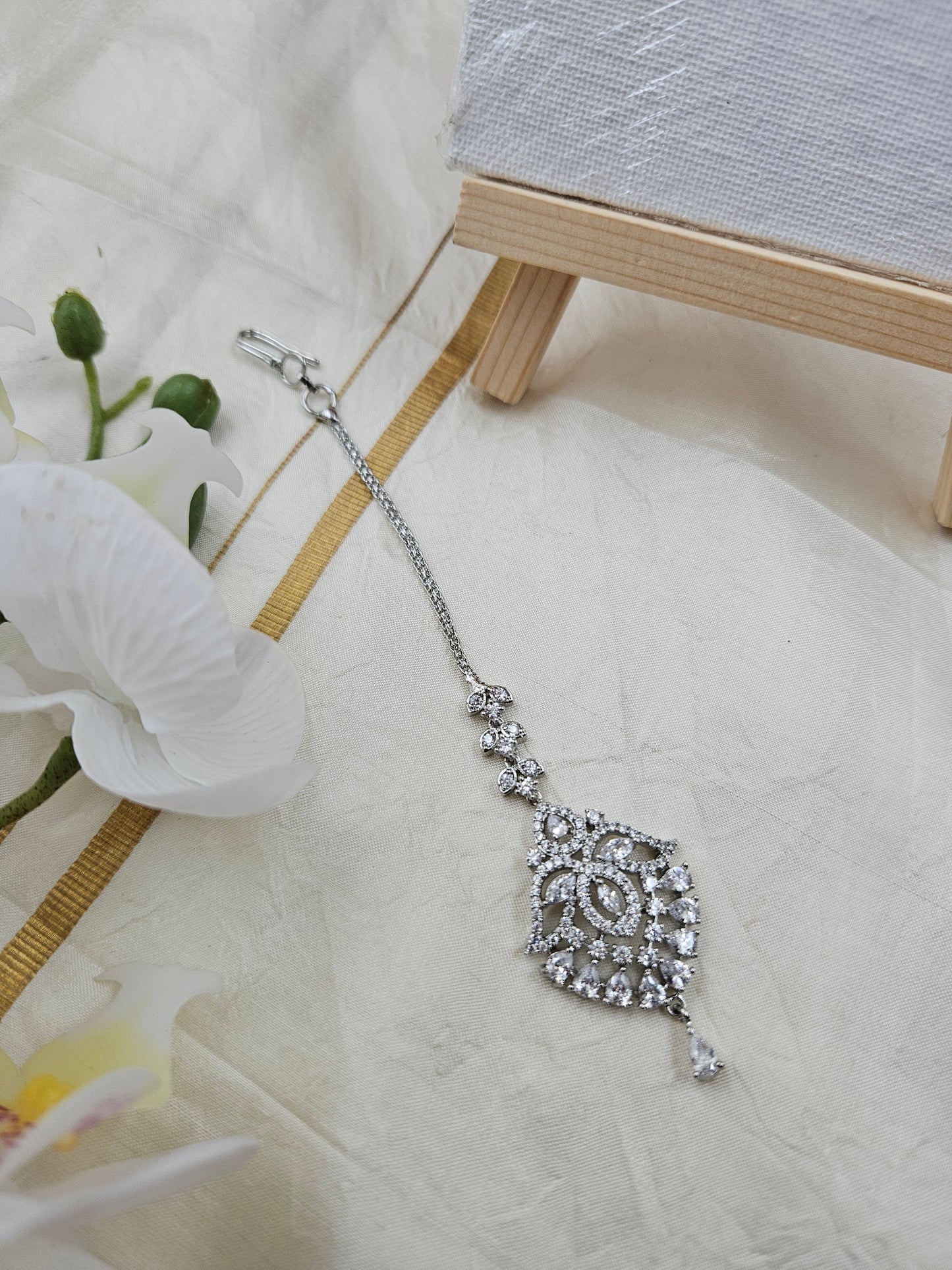 Ad Rhodium polish tikka T081